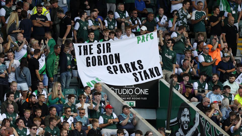 The sir Gordon Sparks Stand banner held in the Devonport End
