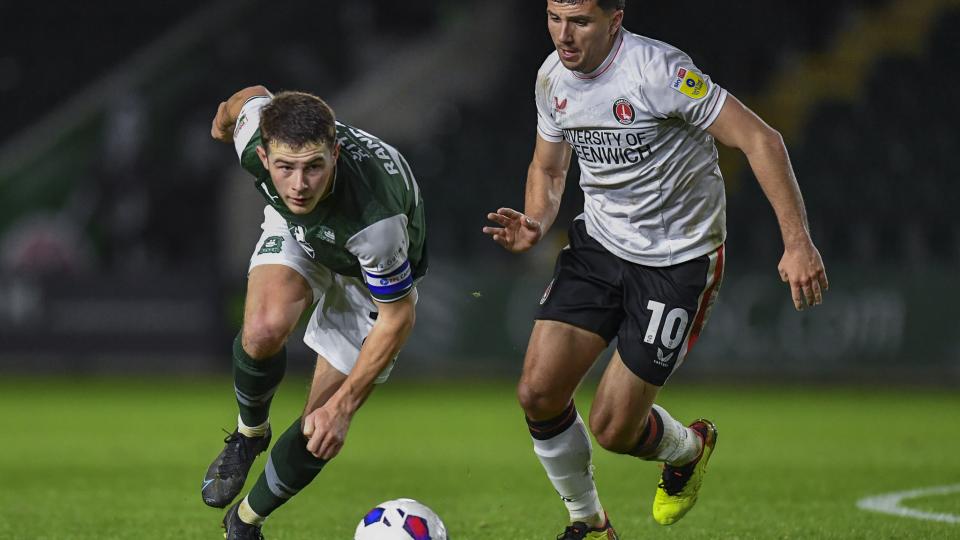 Adam Randell escapes the attention of Albie Morgan