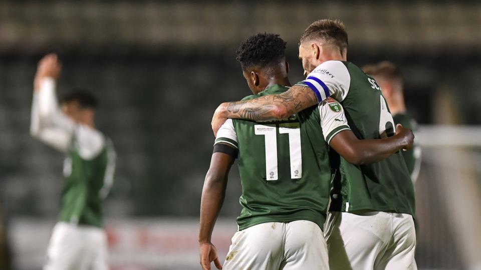 Ennis and Scarr celebrate in group stages