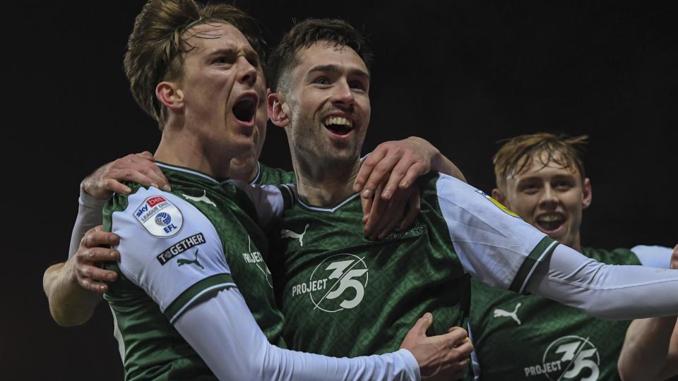Callum Wright and Ryan Hardie celebrate following Argyle's third goal at Oxford