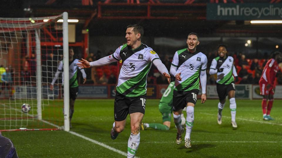 Conor Grant celebrates scoring at Accrington