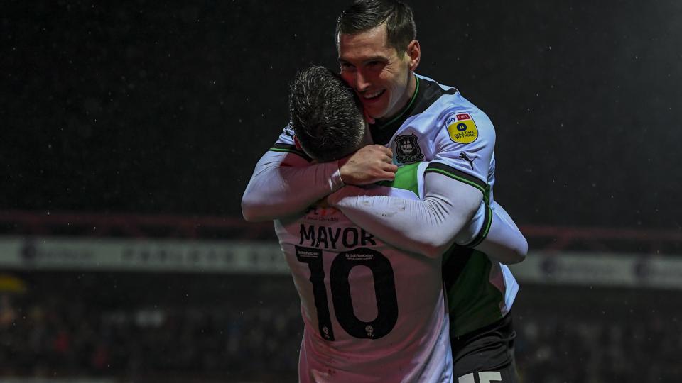 Conor Grant celebrates scoring at Accrington