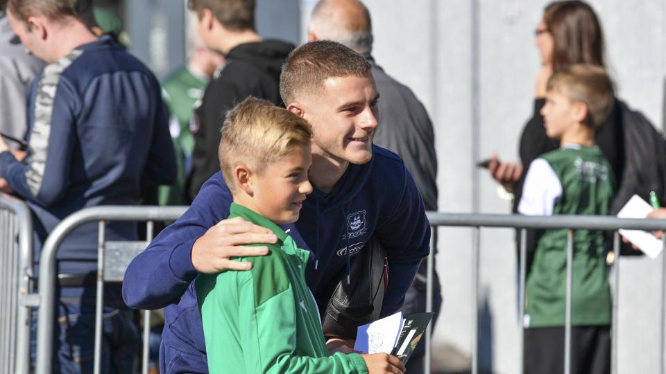Adam Randell with young fan