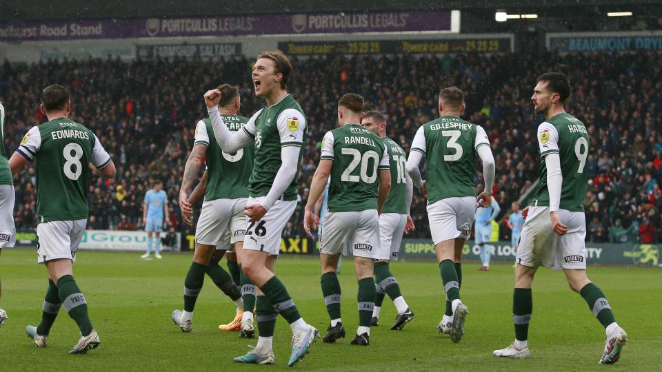 Callum Wright celebrates scoring against Cambridge United