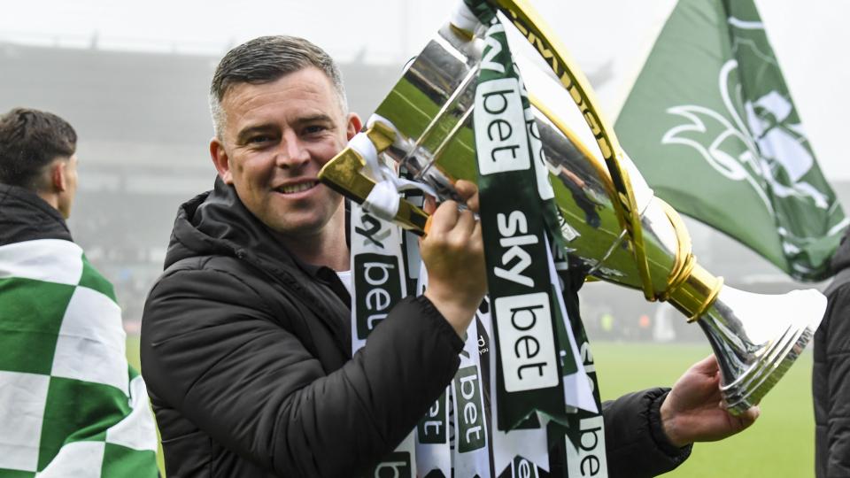 Schumacher with trophy