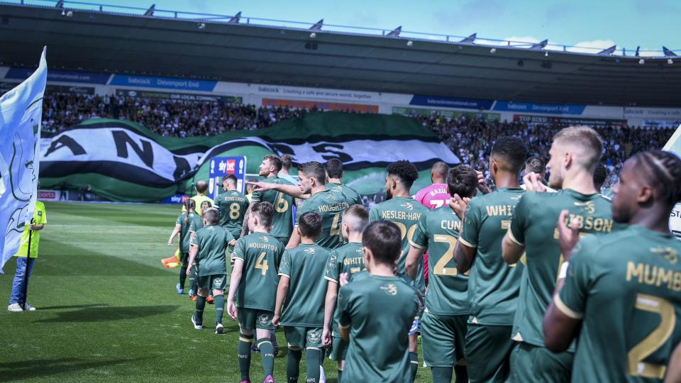 Players walk out towards the Devonport End