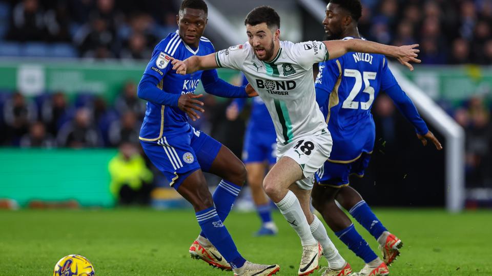 Finn Azaz drives the ball forward against Leicester City