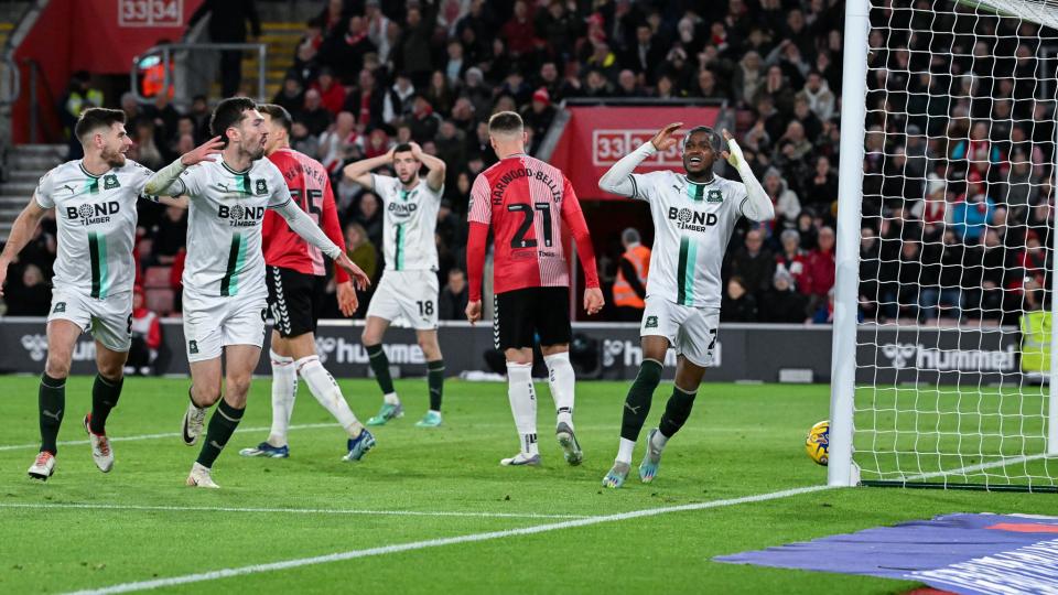 Argyle players react to Bali Mumba's disallowed goal