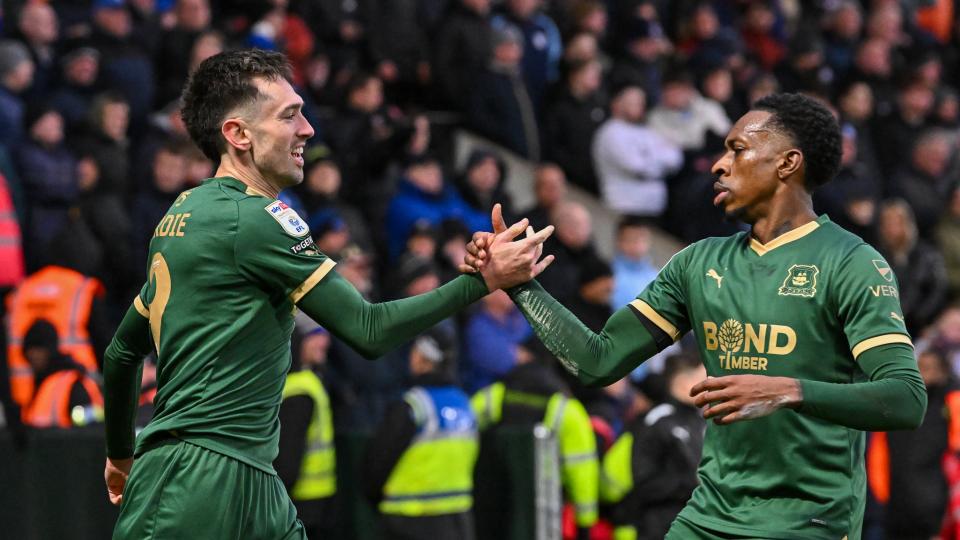 Mickel Miller congratulates Ryan Hardie after he scored against Cardiff 