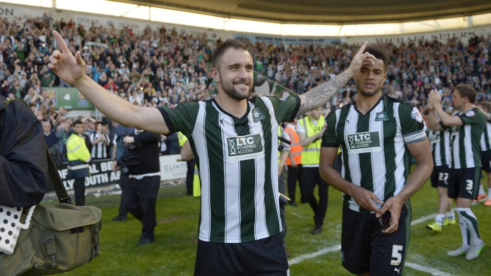 Peter Hartley celebrating with Curtis Nelson