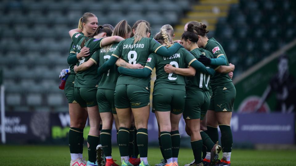 Argyle women huddle