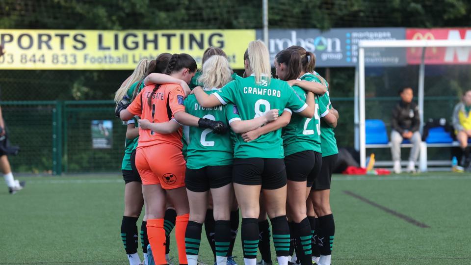 Argyle women huddle