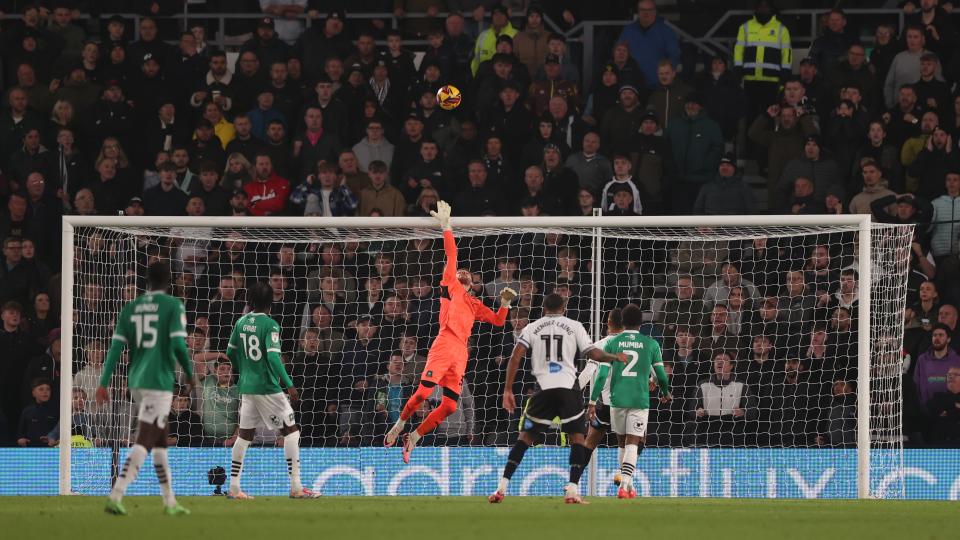 Dan Grimshaw making a diving save