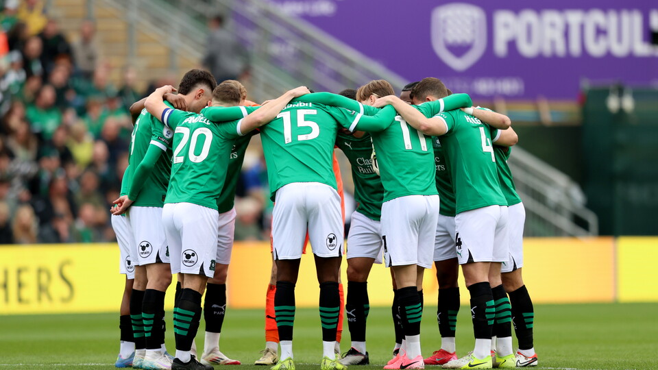 Argyle players huddle before a game