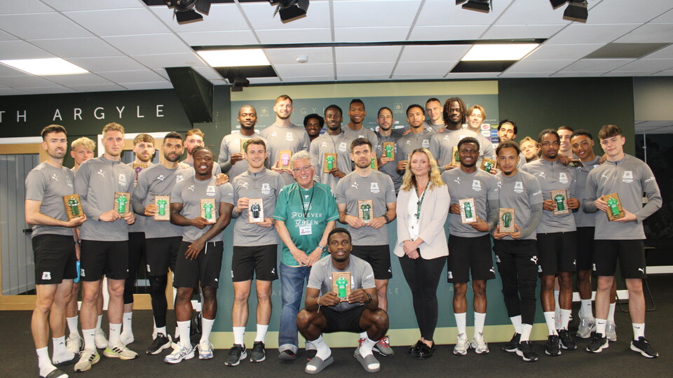 Players receive Forever Green Plaques