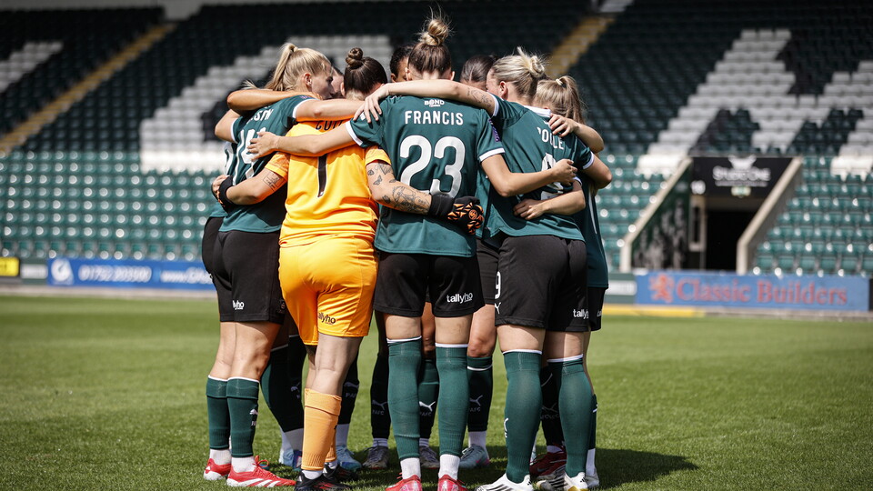 Argyle women huddle