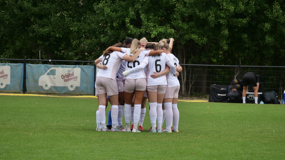Women's team huddle