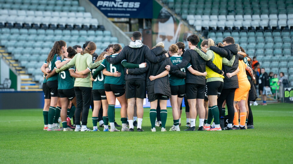 Argyle Women team huddle.