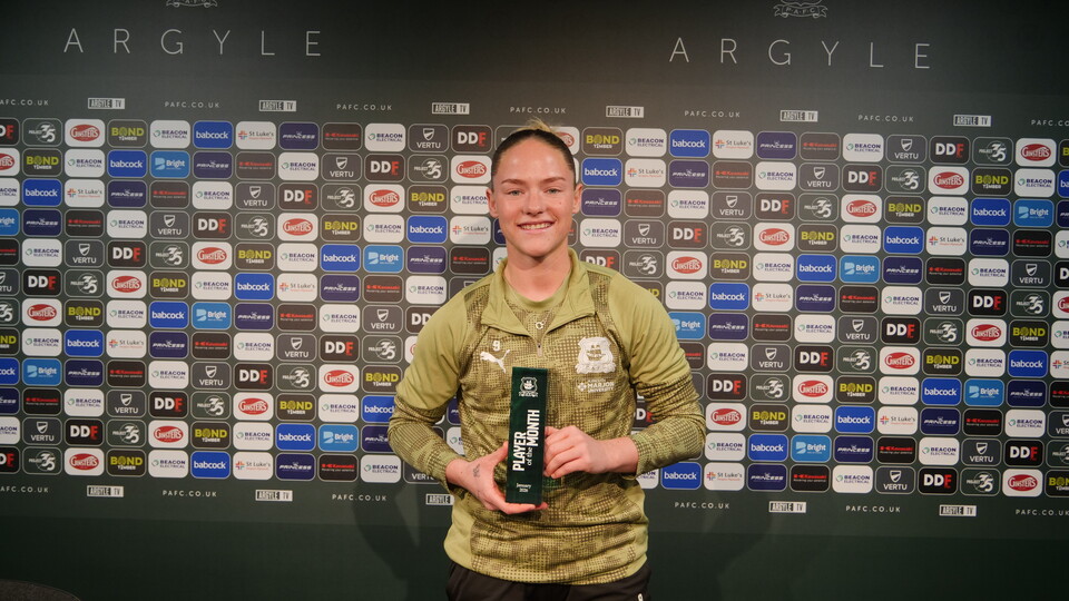 Phoebie Poole with her January POTM trophy.