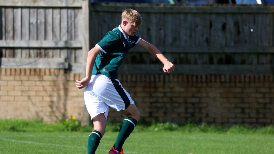 Sam Hayman in action for Argyle Under-18s'.