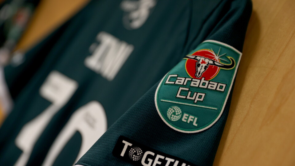 Argyle shirt with Carabao Cup badge on sleeve