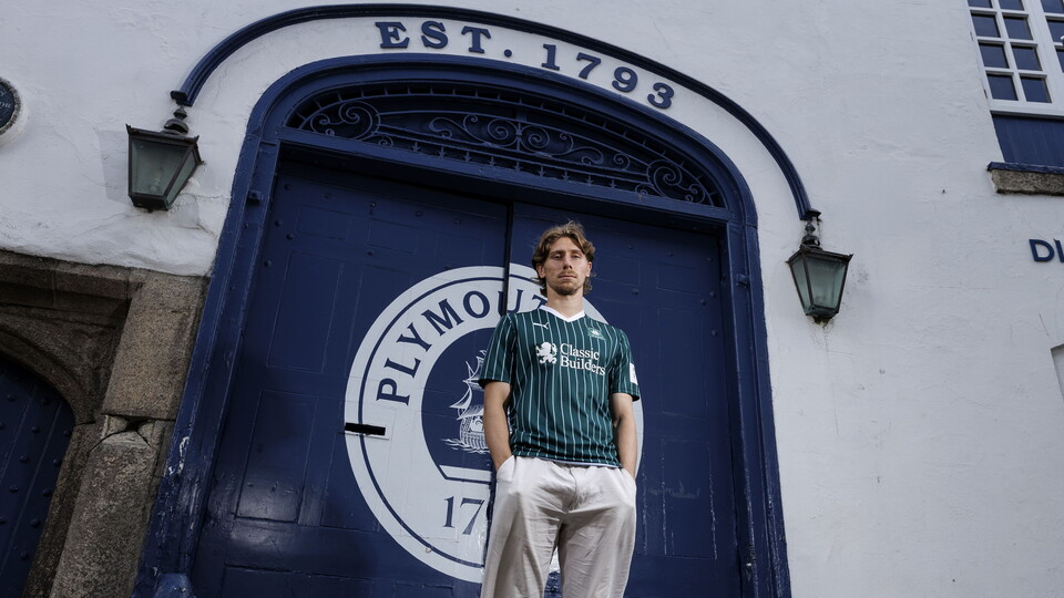 Alex Hartridge stood outside Plymouth Gin