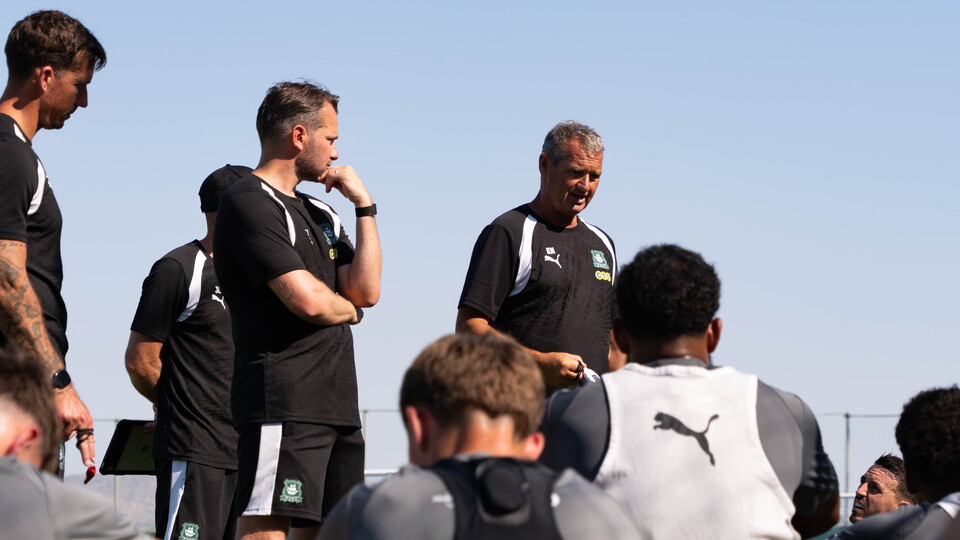 Kevin Nancekivell speaks to Argyle players after an inter-squad match in Spain.