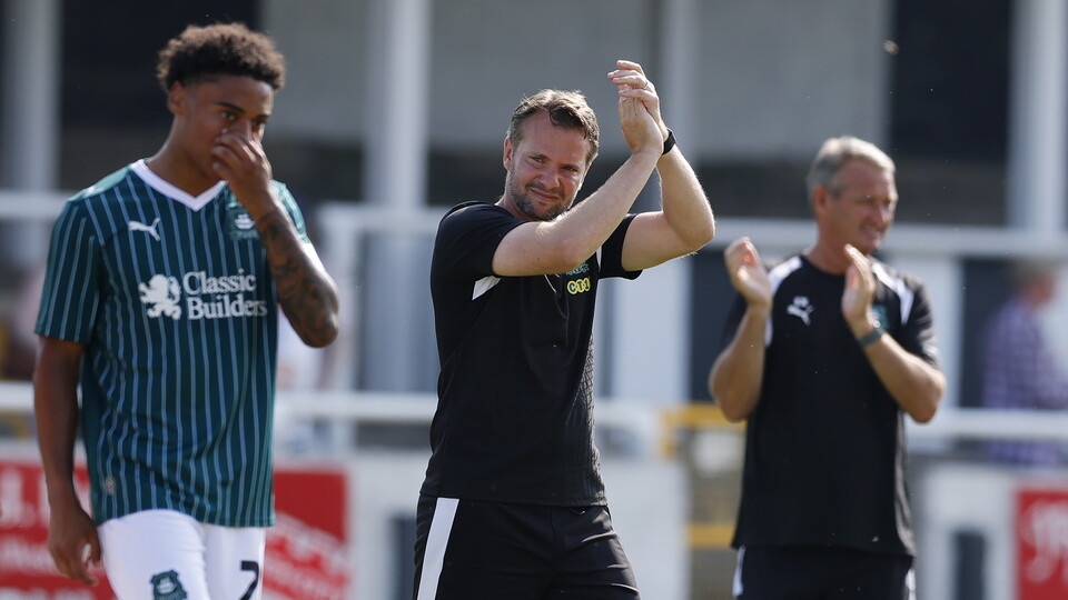 Tom Cleverley clapping supporters at Bath City