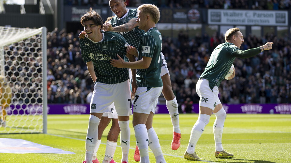 Argyle celebrate scoring against AFC Wimbledon